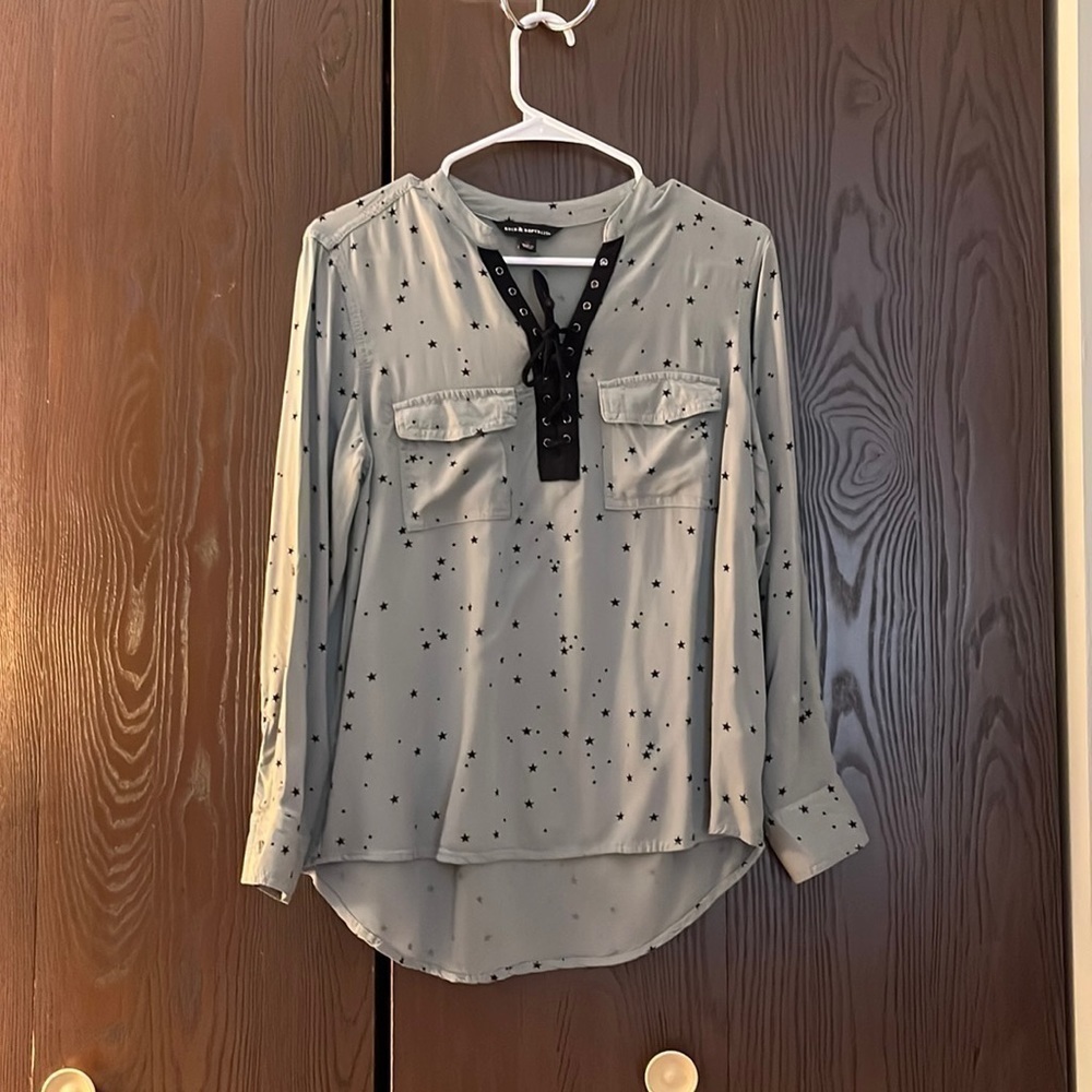 Rock & Republic long sleeved Olive green blouse decorated with black stars. Med